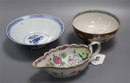 A Chinese blue and white porcelain bowl, Jiajing mark, a 19th century brown ground bowl and a Chien Lung sauceboat (18, 20 & 21),